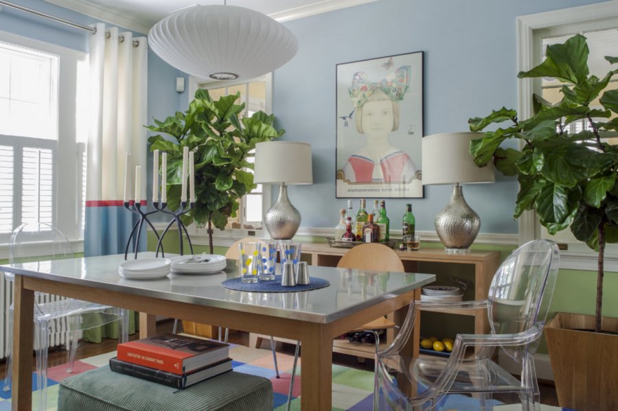 Cheery dining room with a stainless steel table