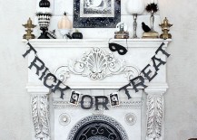 Classy-Halloween-decor-that-doesnt-cover-up-this-fireplaces-beautiful-details-217x155