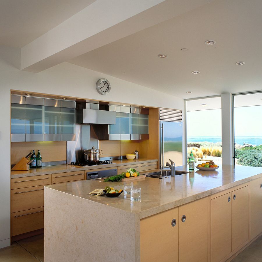 Clean and crisp kitchen design with stone worktop