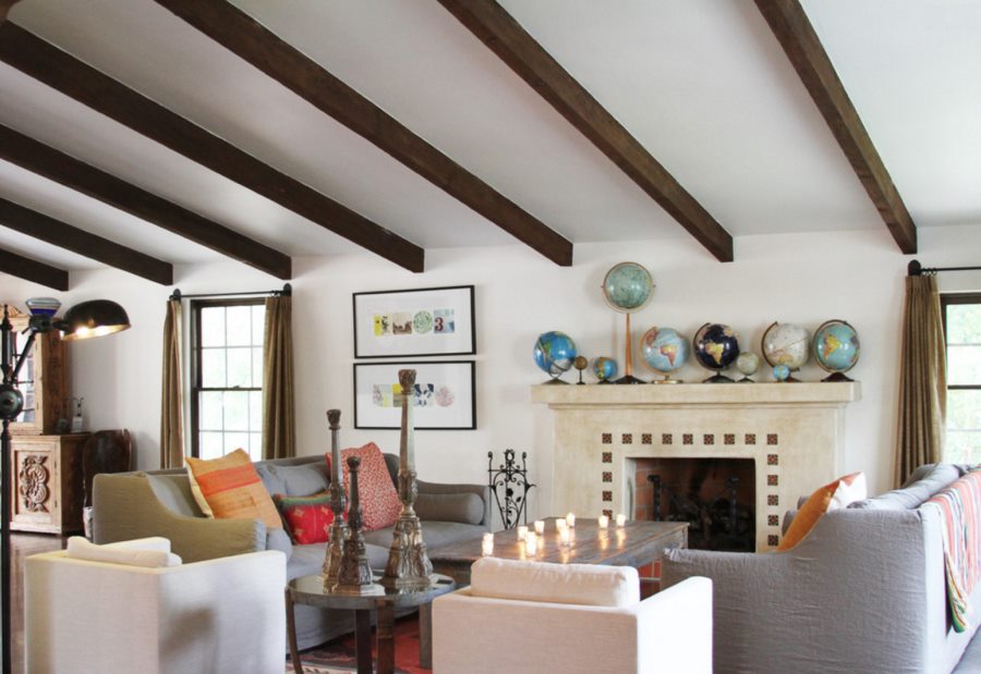 Collection of globes on a fireplace mantel