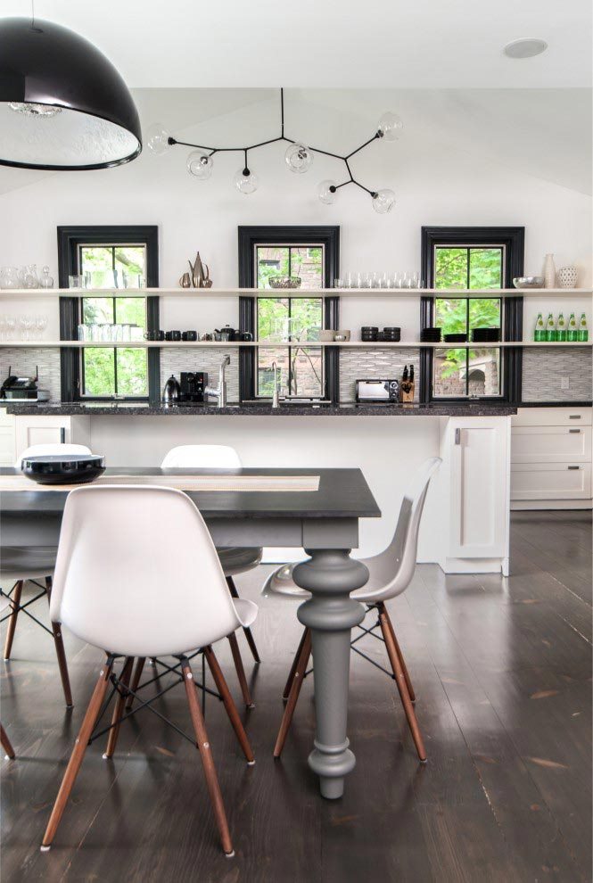 Collections of glass and dinnerware on open kitchen shelving