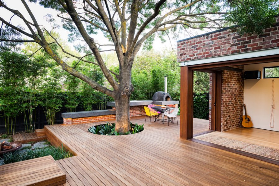 Colorful dining chairs on a large deck