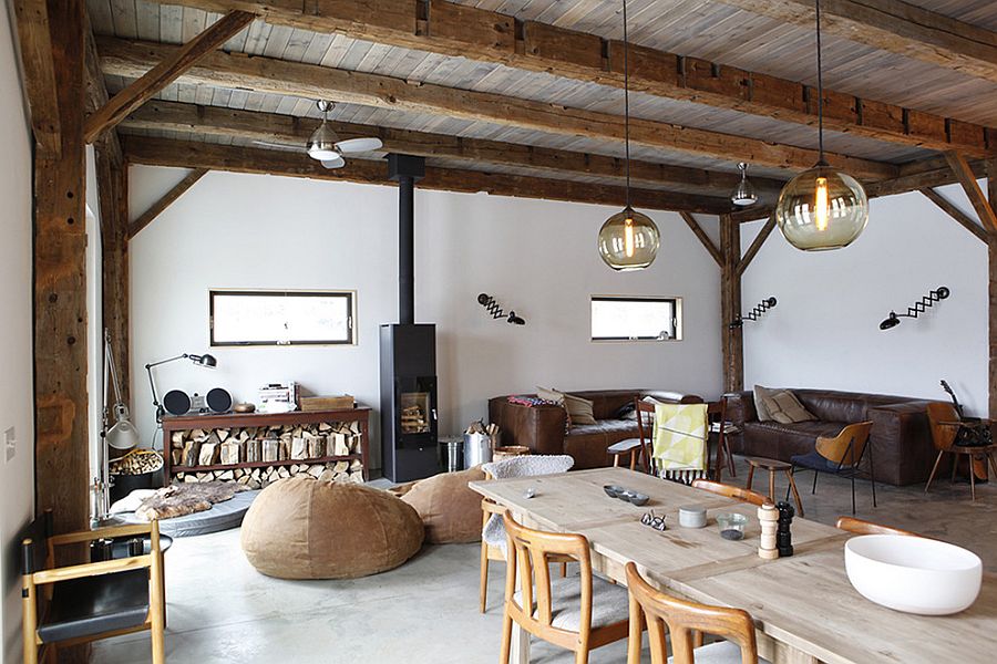 Concrete slab with radiant heating system makes up the floor of the rustic living room
