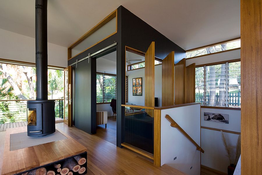 Contemporary dedicated TV room with wooden windows [Design: Matt Elkan Architect]