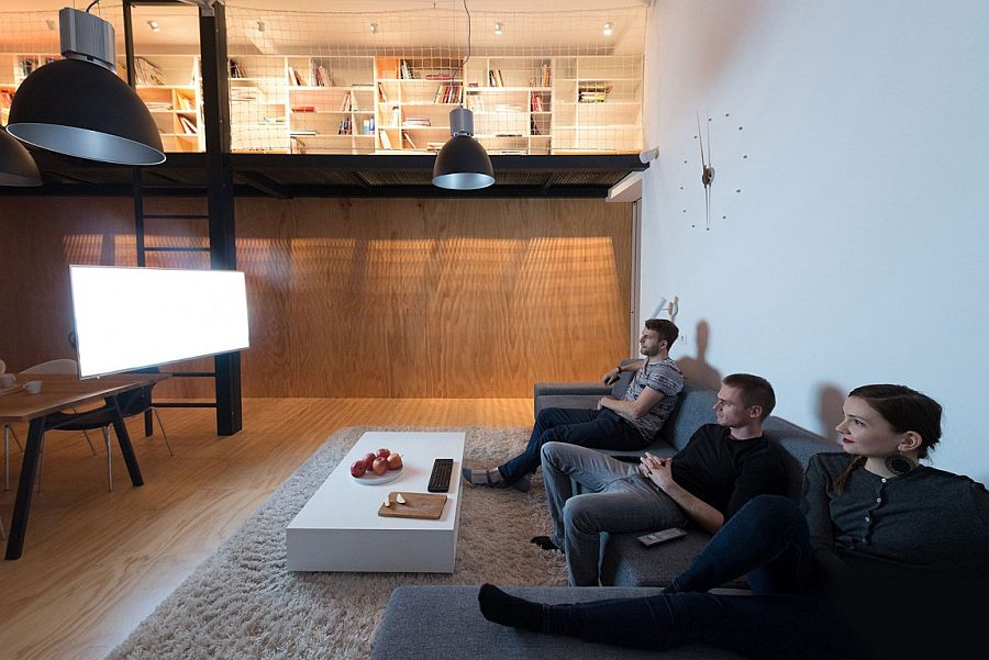 Cozy couch in gray for the living room with low-slung white coffee table