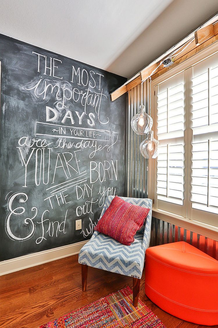 Cozy reading nook in the bedroom with a chalkboard wall [Design: Simply Unique Finds]