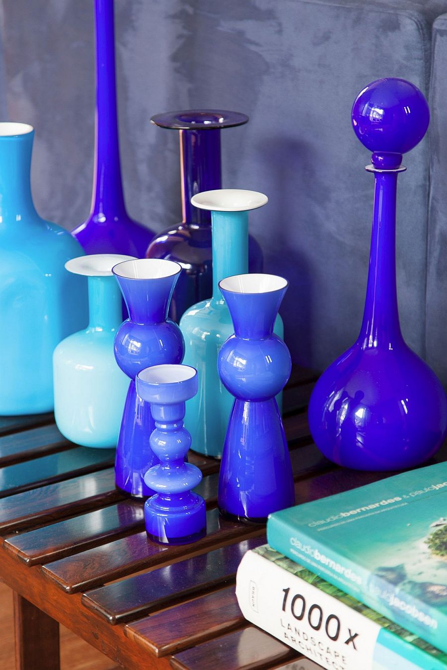 Curated collection of glossy vases in various shades of blue