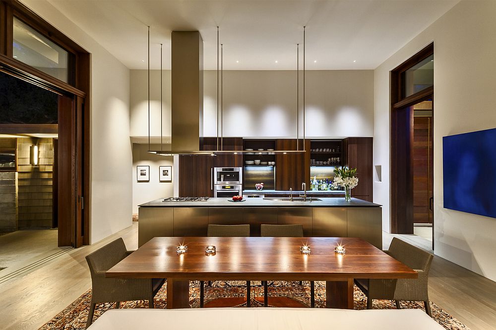 Custom Boffi kitchen with a sleek island and an integrated hood above steals the spotlight