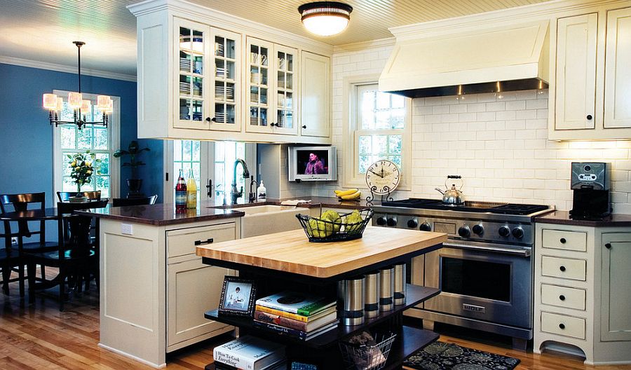 Custom built kitchen island in cherry wood stained with open shelves [Design: Anna Berglin Design]