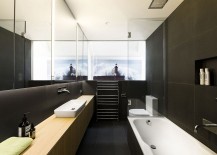 Dark-bluestone-creates-a-sophisticated-backdrop-for-the-relaxing-bathroom-217x155