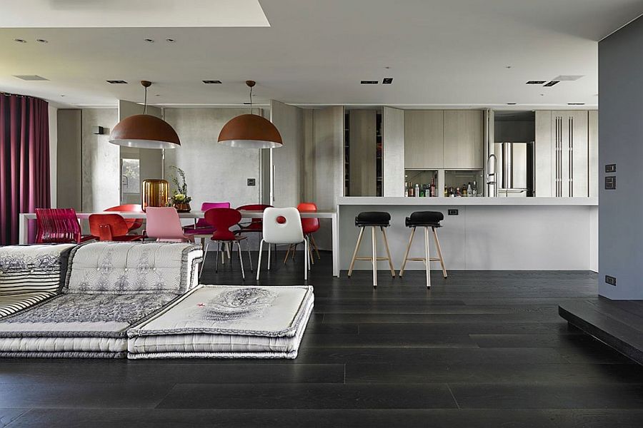 Dark floors create a visual contrast in the lliving area