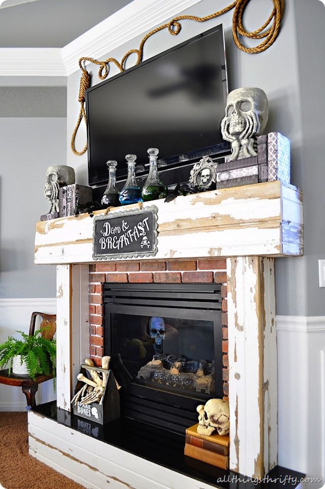 'Dead & Breakfast' Halloween decor for a fireplace with room for a TV