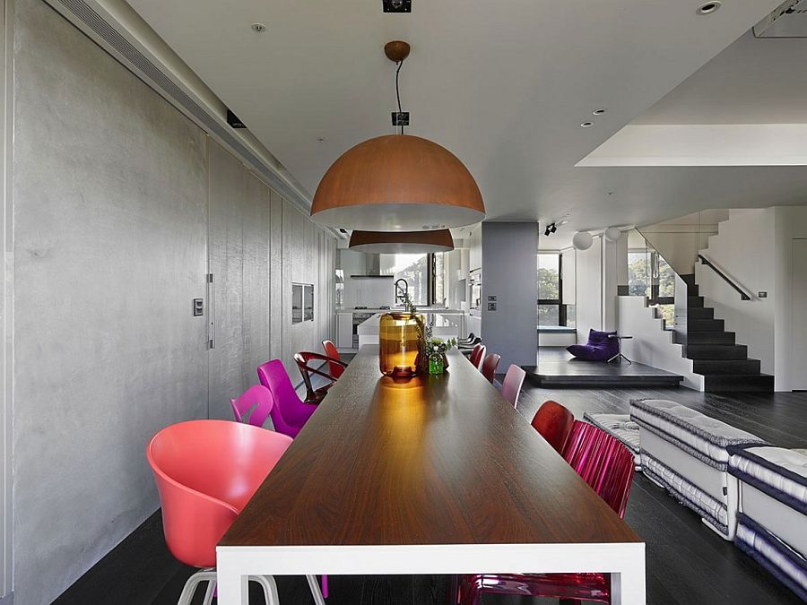 Eclectic mix of colorful chairs for the chic dining room