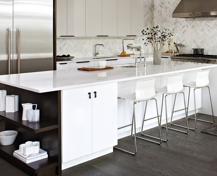 Elegant white kitchen island with dark, open shelves