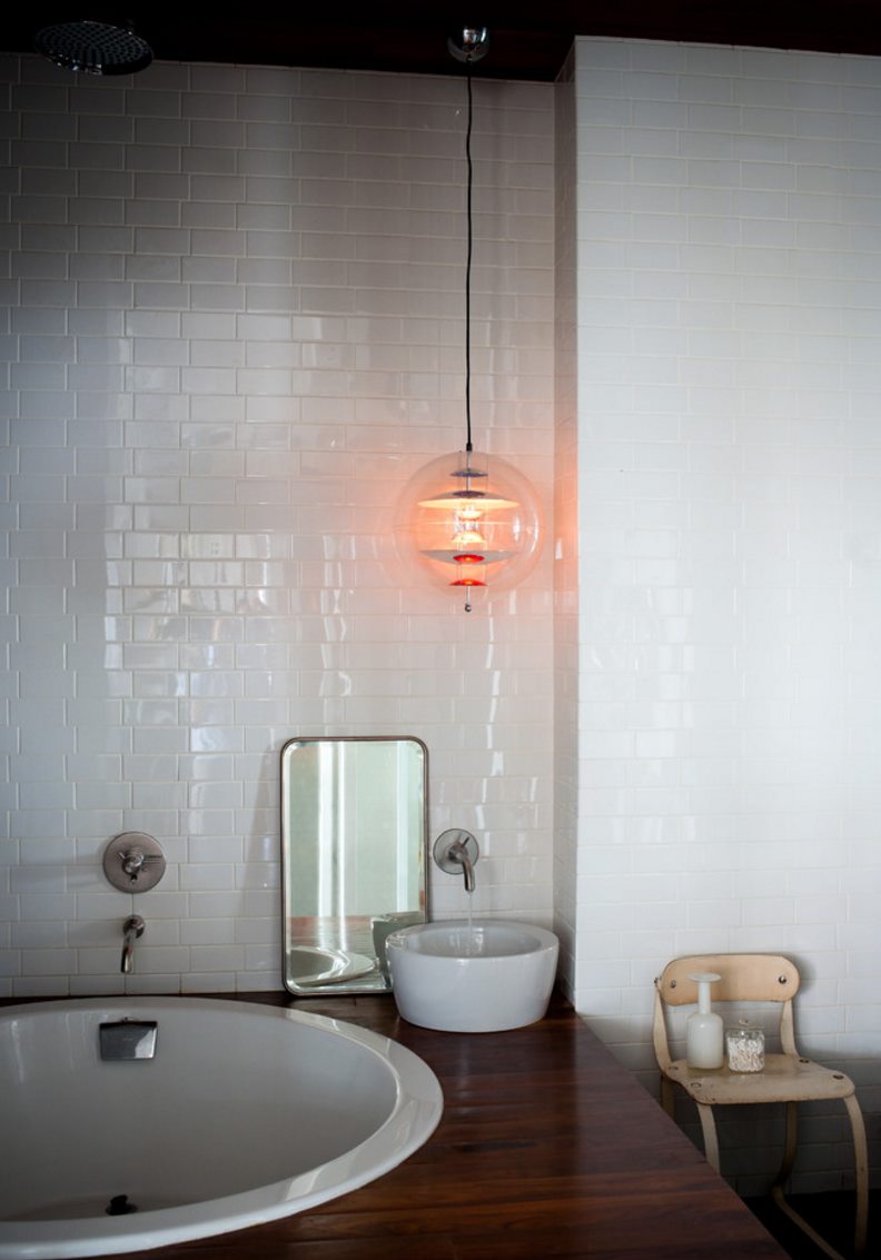 Farmhouse bathroom with a round tub