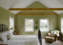Farmhouse-style-bedroom-in-white-and-green-with-wooden-beams-217x155