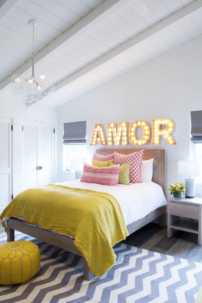 Four marquee letters to spell the word amor