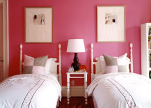 French-cane-beds-against-a-boldly-painted-wall-217x155