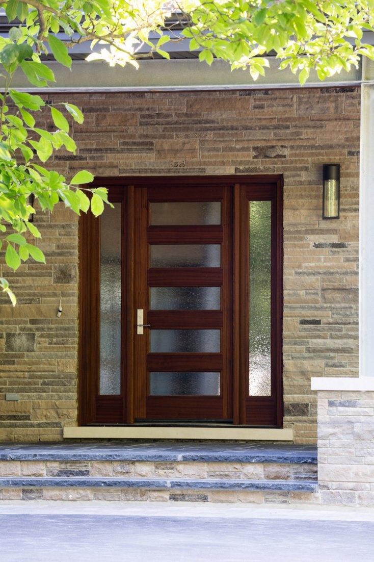 Front door featuring rain glass