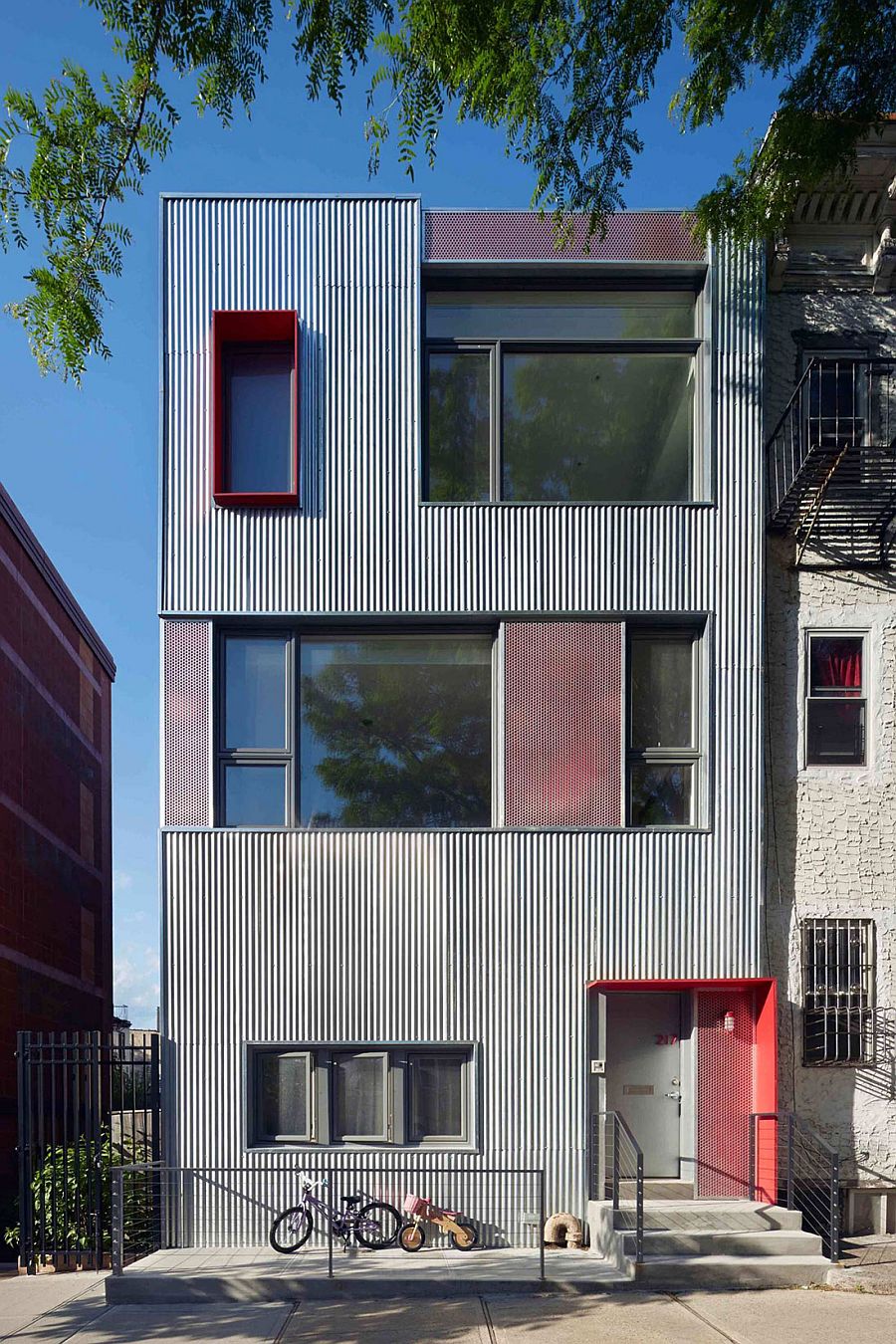 Galvanized steel shapes the distinct extreior of the renovated home