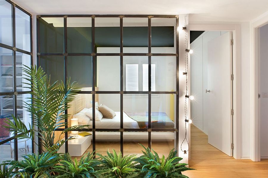 Glass partitions with steel frame give the interior an airy appearance