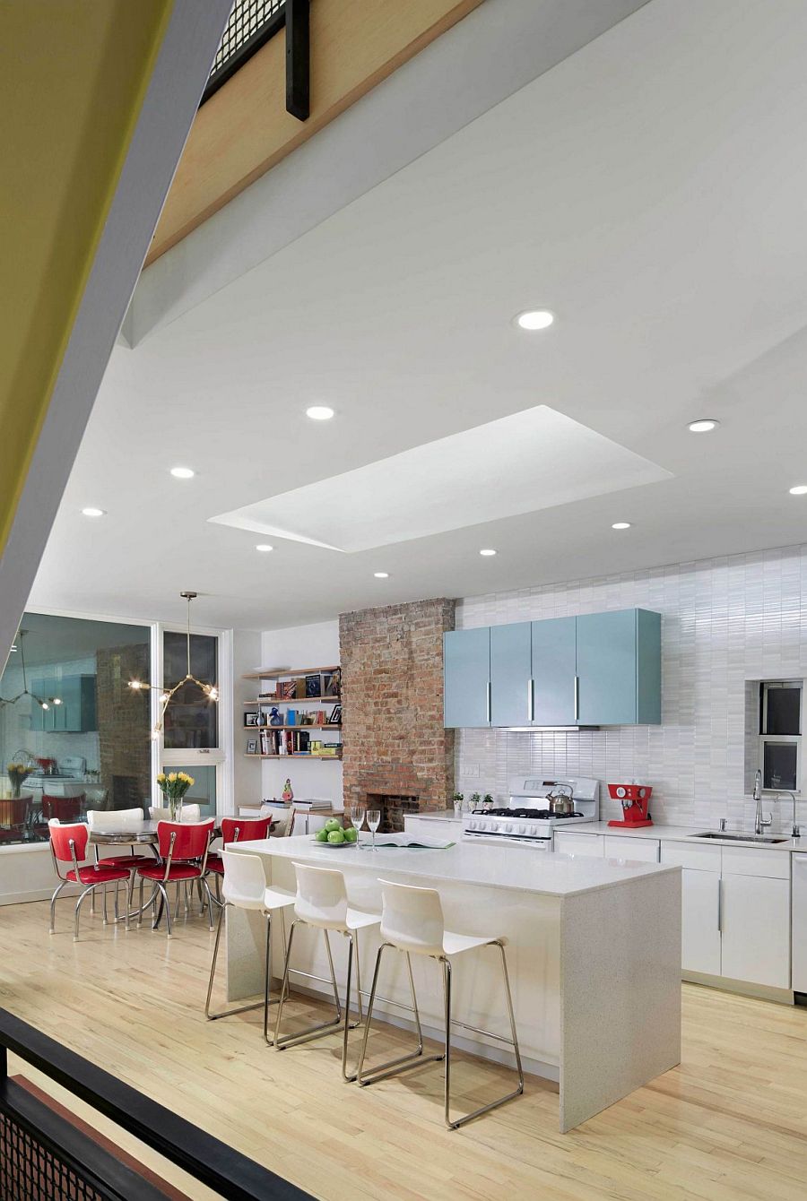 Gorgeous kitchen and dining area design with red accents