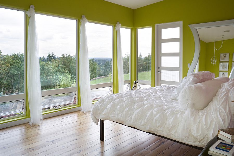 Green and white create a cozy setting in the contemporary bedroom