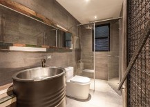 Industrial-bathroom-with-a-wooden-frame-for-mirror-217x155