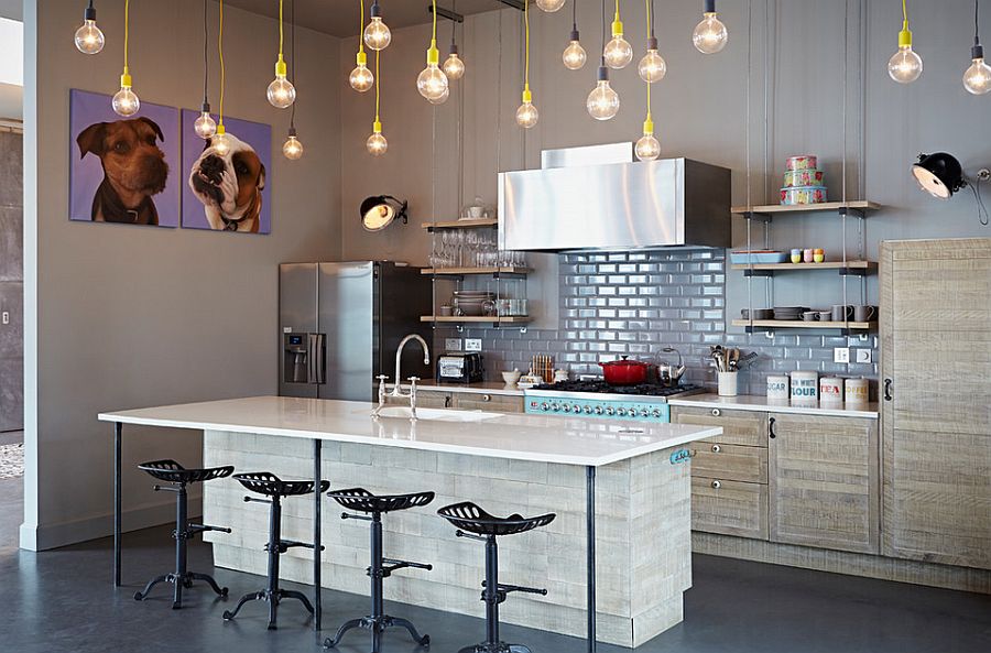 Kitchen in gray with brilliant yet simple pendant lighting [Design: Godrich Interiors]