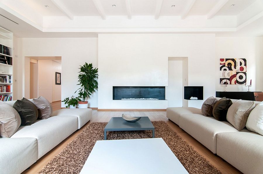 Large couches create a cozy living room that is both modern and classy