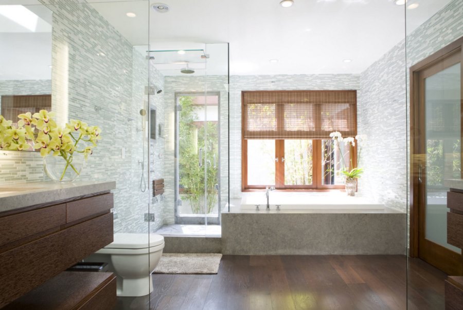 Large vase of flowers in an upscale modern bathroom