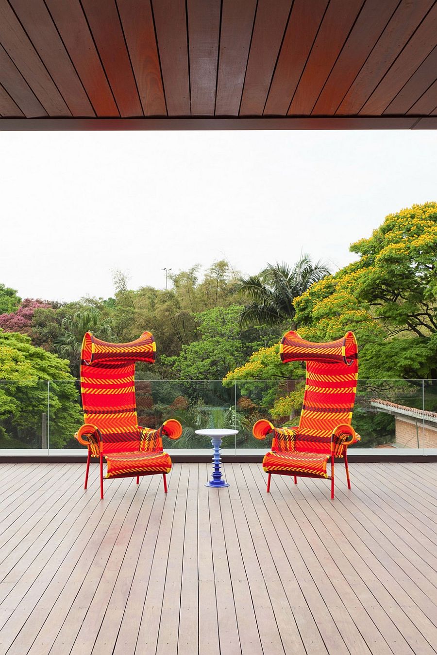 Lavish wooden deck of the Brazilian home with unabated view of canopy outside