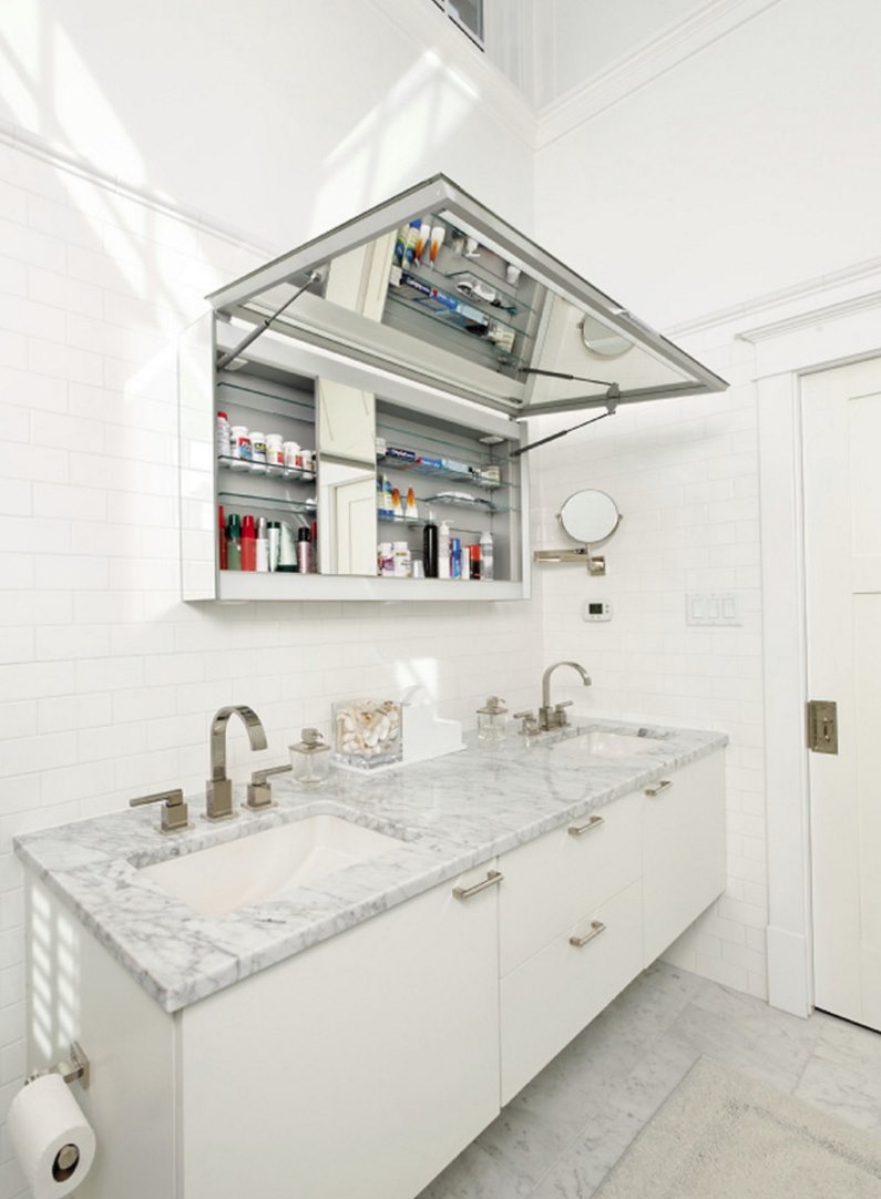 Medicine cabinet with an upward lifting door