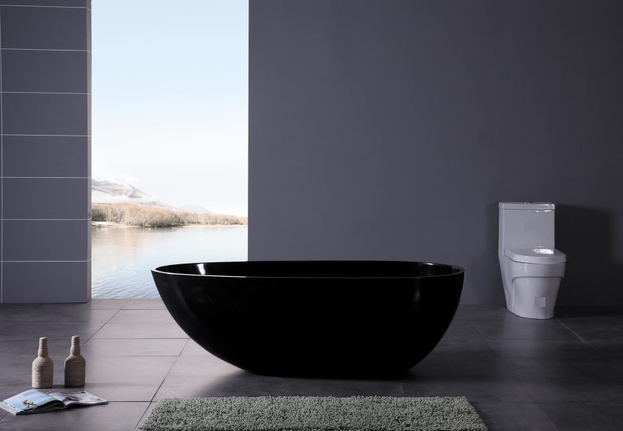 Modern black bathtub in a grey powder room