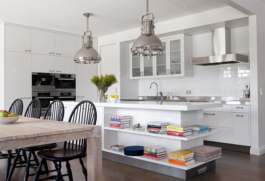 Modern kitchen with industrial style lighting and white island with open shelves [Design: Diane Bergeron Interiors]