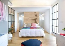 Modern-minimal-bedroom-with-a-wooden-accent-wall-217x155