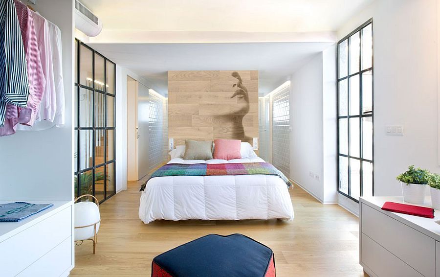 Modern minimal bedroom with a wooden accent wall