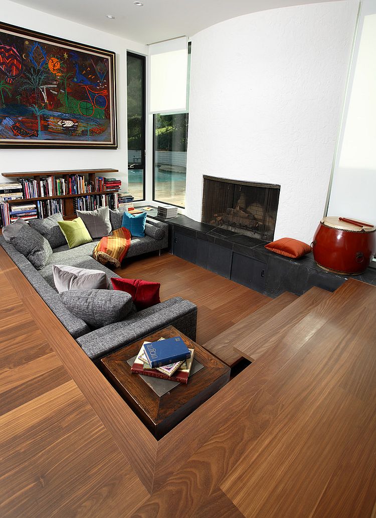 Modern sunken living room with pops of color