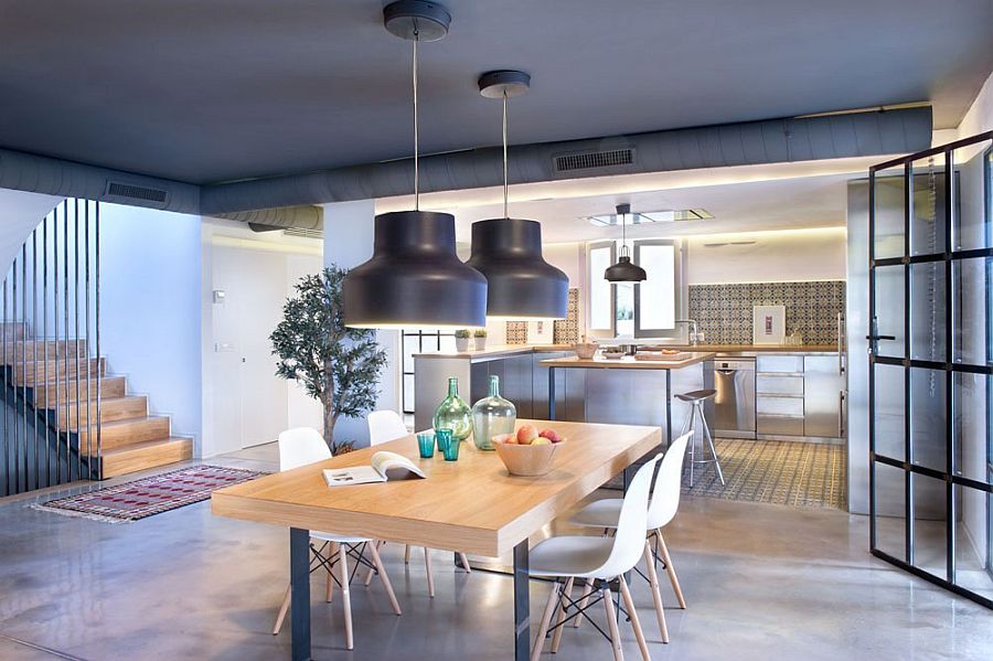 Open design plan creates a flowing interaction between kitchen and dining space