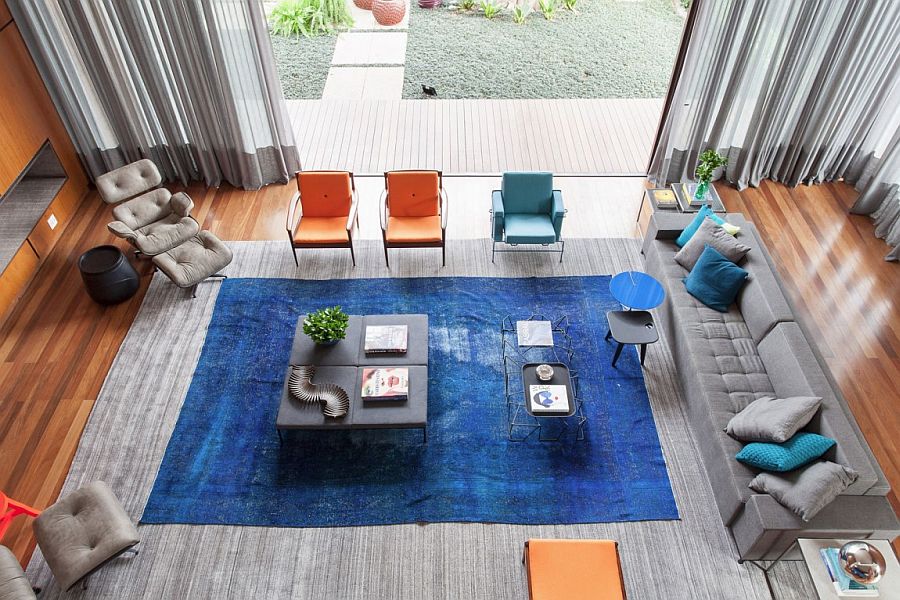 Orange and blue hues in the living room bring color to Casa IV