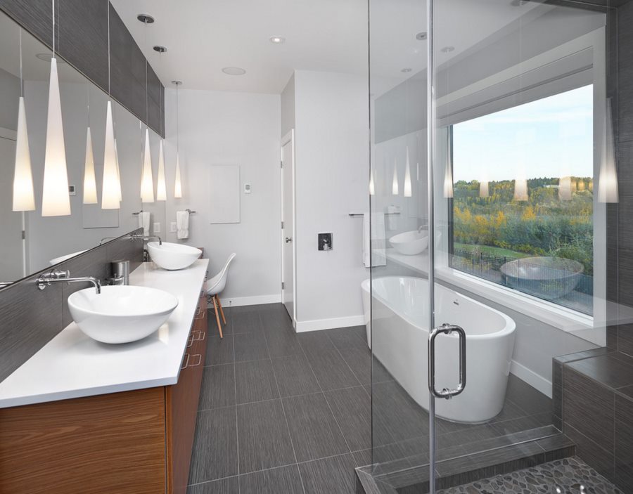 Powder room with a round tub and a view