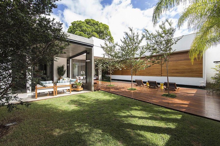 Private garden and wooden deck extend the living space outdoors