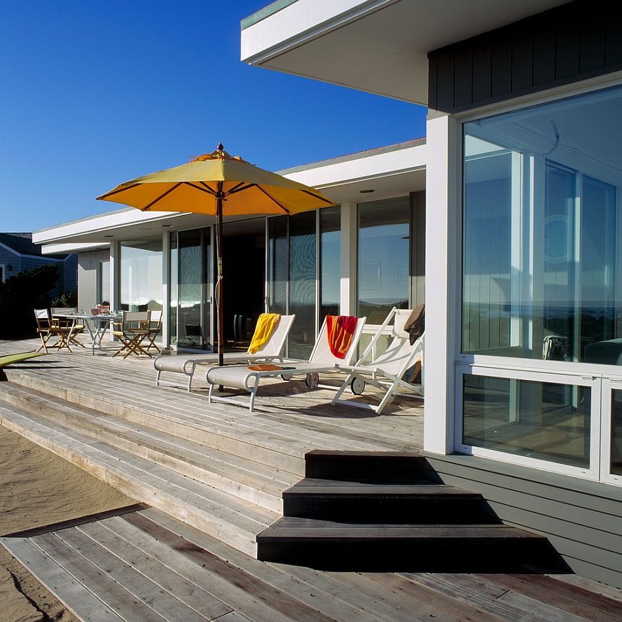 Relaxing recliners and outdoor dining space for the deck