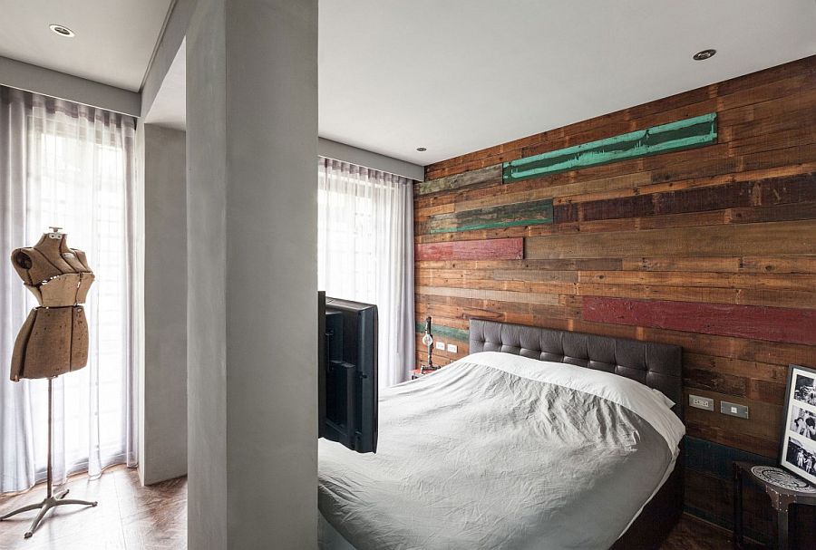Salvaged wood accent wall in the bedroom