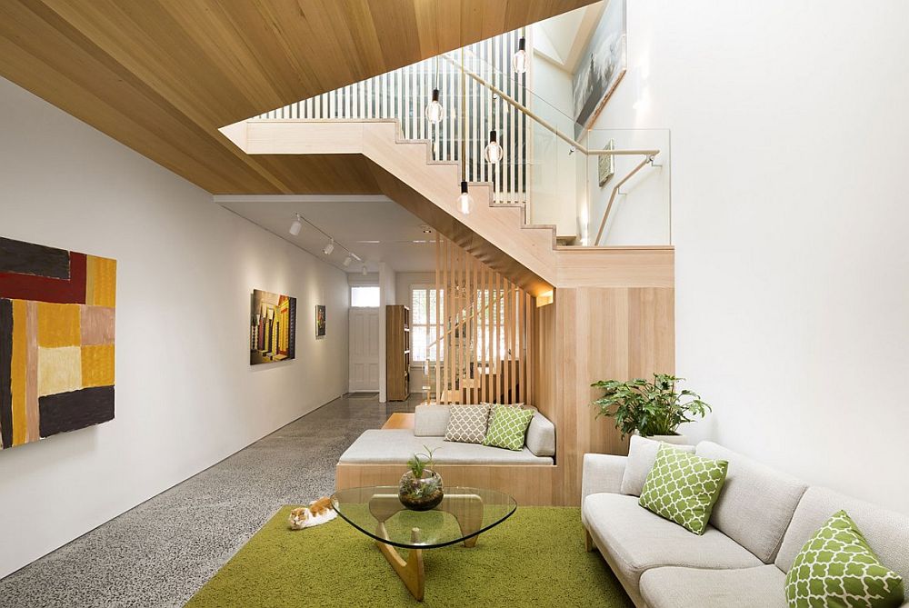 Sculpted timber stair becomes the focal point of the revamped living room