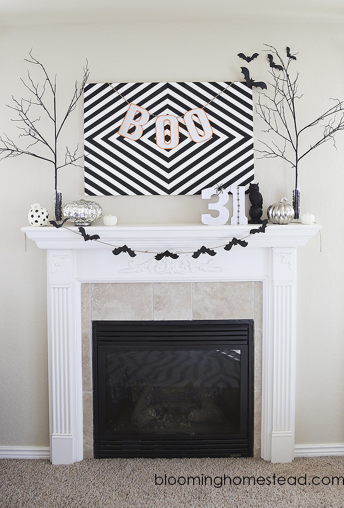Simple black and white Halloween decor for a fireplace