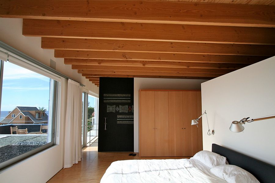 Sliding door clad in chalkboard paint for the modern bedroom [Design: The Brown Studio]