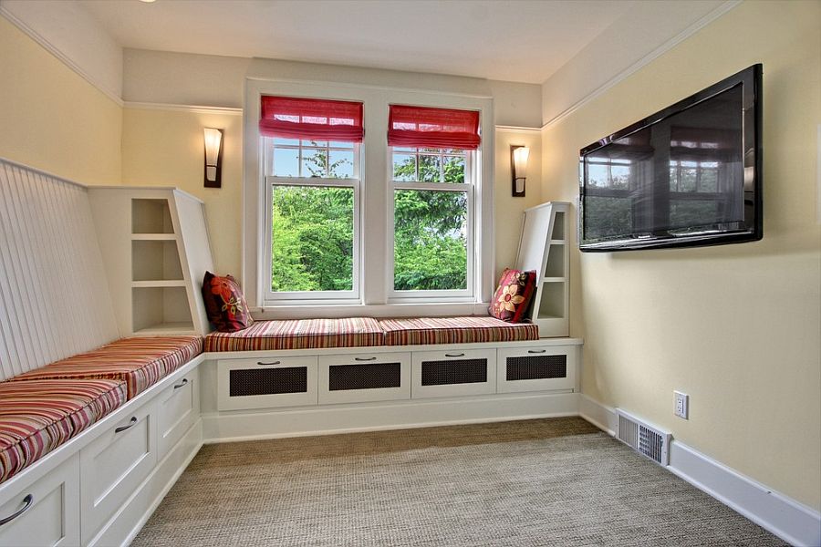 Small TV room with custom built-in banquette and storage [Design: Sortun-Vos Architects]