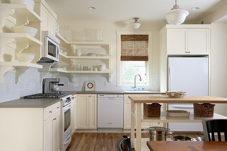 Combination kitchen/living room with shelves in kitchen island