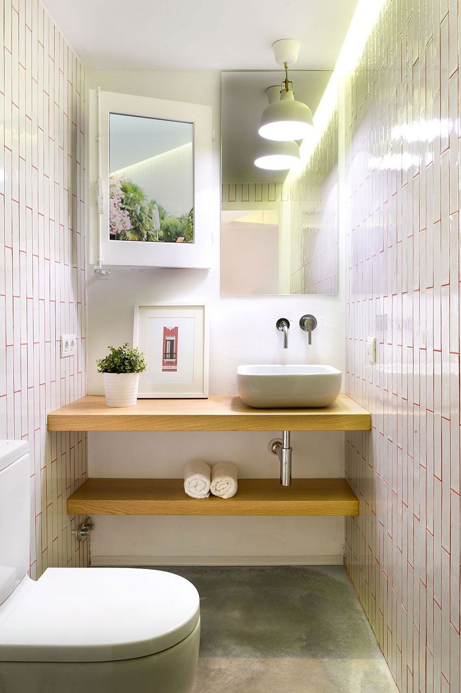 Small powder room with floating wooden shelves